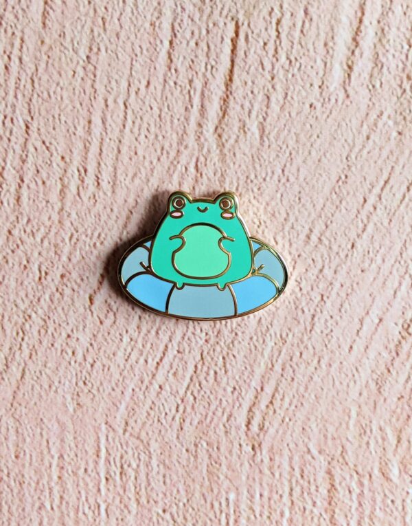 Staying Afloat Frog Enamel Pin